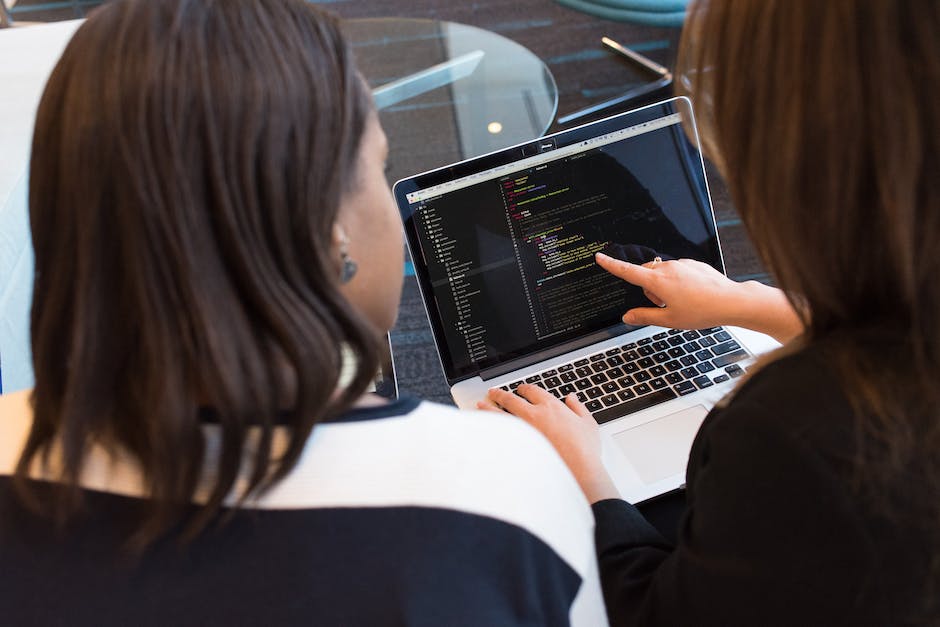 An image of a person using a computer to work on a website